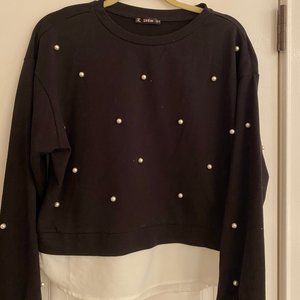 Black sweater with white pearls